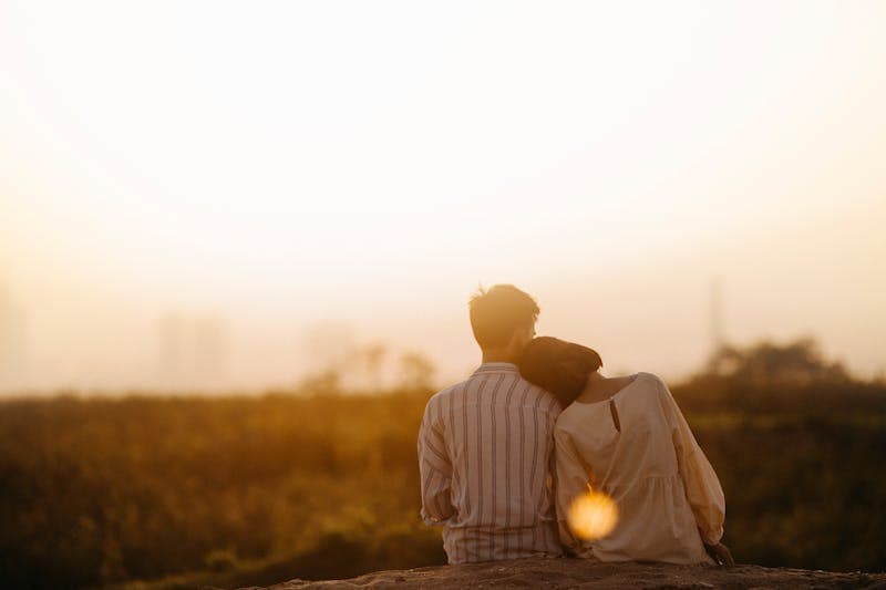Couple holding hands while enjoying an activity together